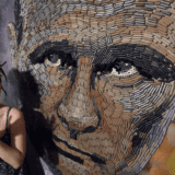 The Face of War stands more than two metres tall and dominates the artist's studio apartment.(AFP: Sergei Supinsky)